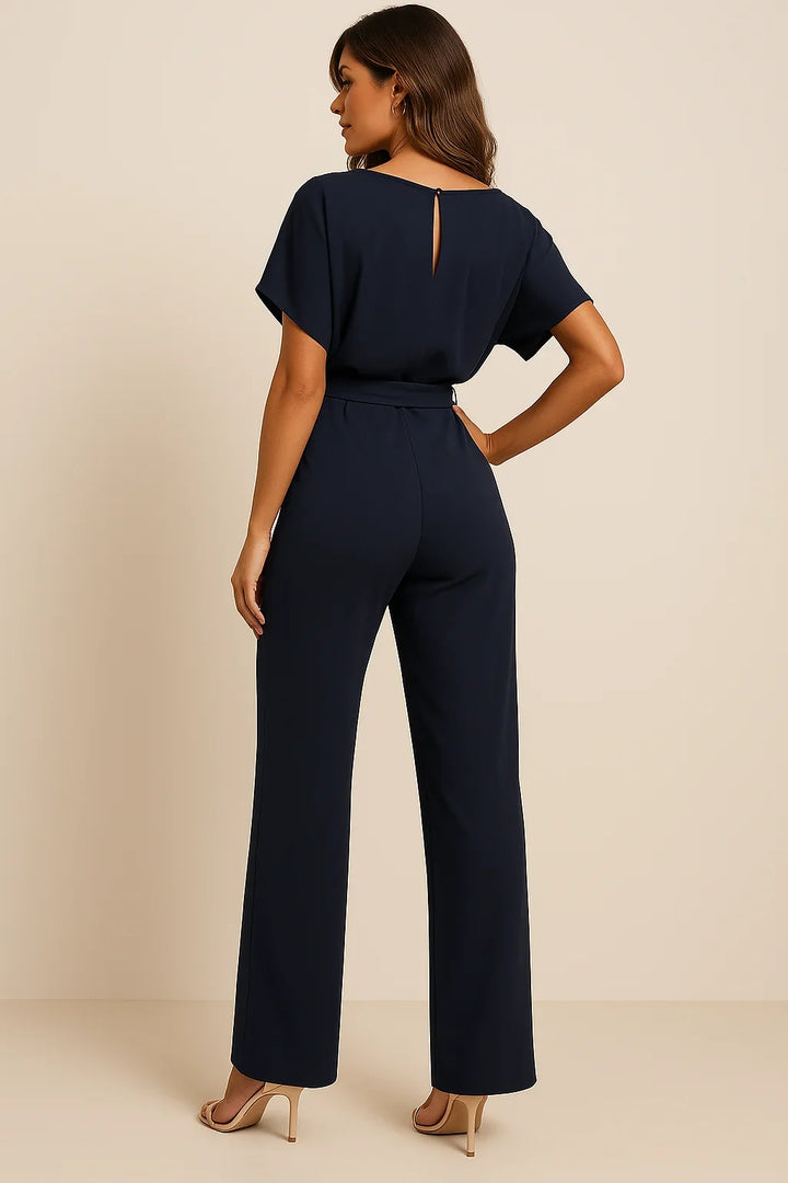 Black women's elegant short sleeve wide leg jumpsuit with a stylish tie waist. Perfect for any event.