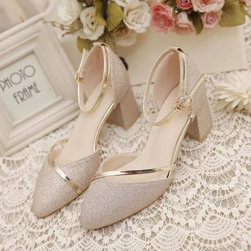 Step out in style with these comfortable women's evening shoes, showcasing block heels and an ankle strap.
