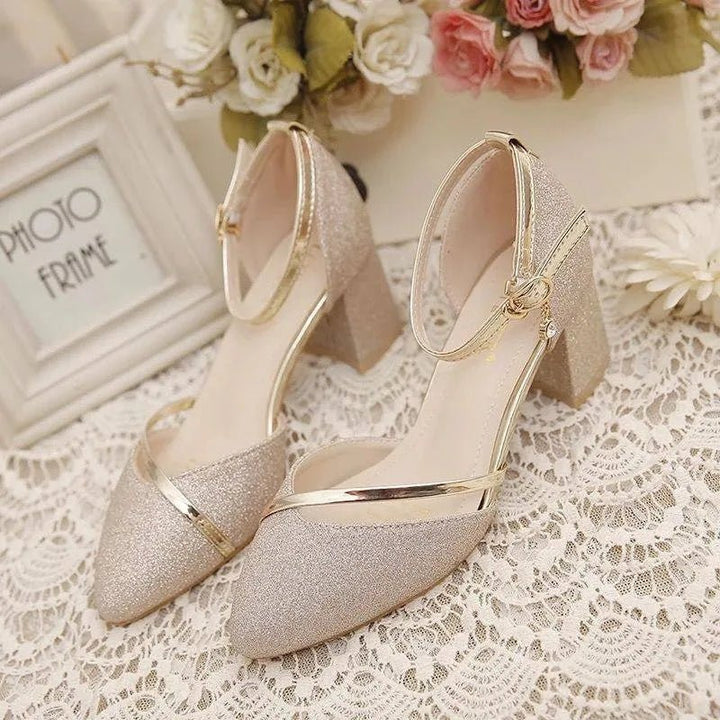 Step out in style with these comfortable women's evening shoes, showcasing block heels and an ankle strap.