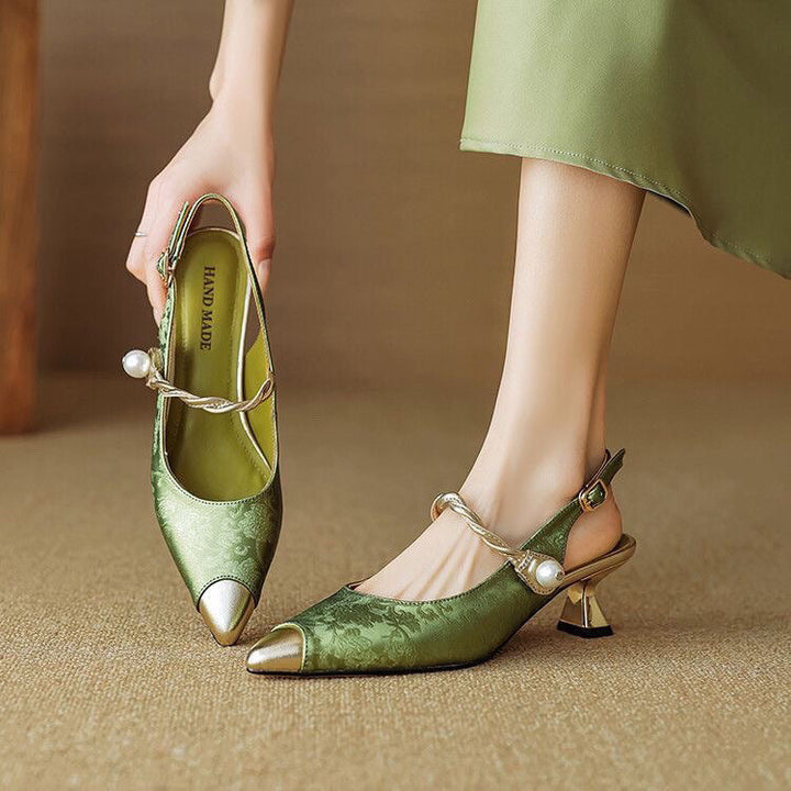 Women's elegant slingback heels with pearl strap & pointed cap toe. Perfect for formal events.