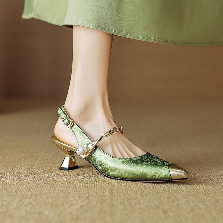 Fashionable women's pointed cap toe slingback heels, pearl strap, kitten heel for elegant wear.