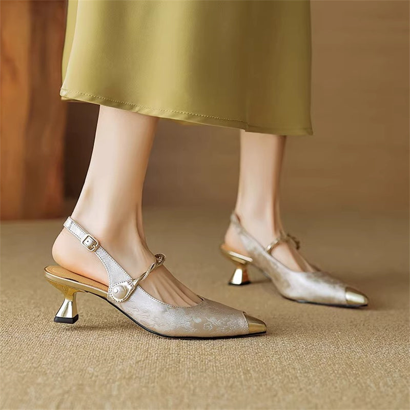 Formal women's pearl slingback heels, pointed cap toe. Elegant footwear for special occasions.