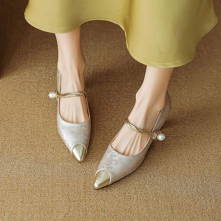 Stylish women's slingback heels, pearl ankle strap, pointed cap toe. Essential for fashion footwear.