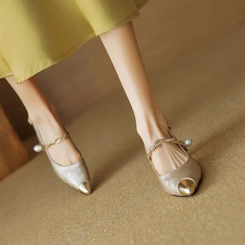 Women's fashion slingback heels, elegant pearl strap, pointed cap toe. Perfect for evening events.