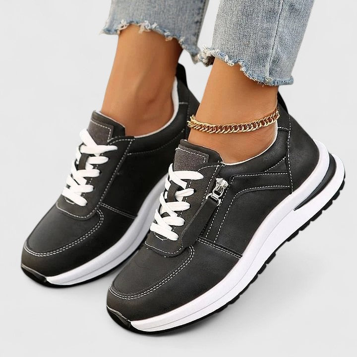 Stylish women's slip-on sneakers for elegant casual wear, designed with comfort & ease in mind.