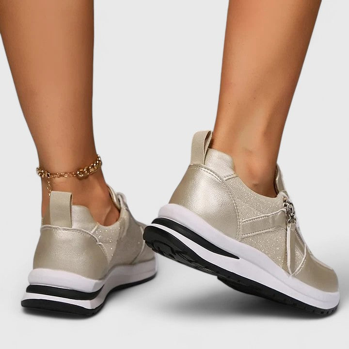 Full view of elegant women's slip-on sneakers, offering arch support & a comfortable fit for daily wear.
