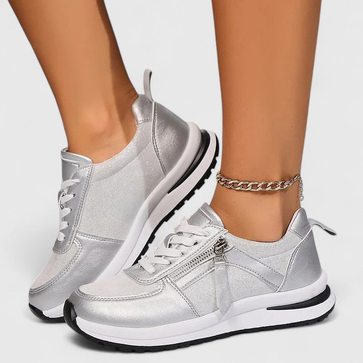 Close-up of women's comfortable slip-on sneakers, highlighting arch support & non-slip walking sole.