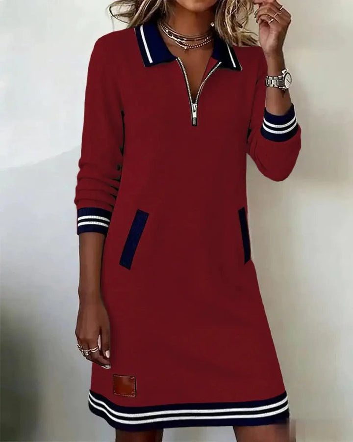 Versatile women's long-sleeve midi dress, zip-collar design, subtle striped trim & convenient pockets.