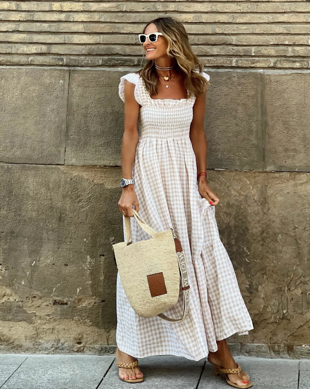 Women's elegant smocked maxi dress, perfect for casual comfort & summer style. Flowy & versatile.