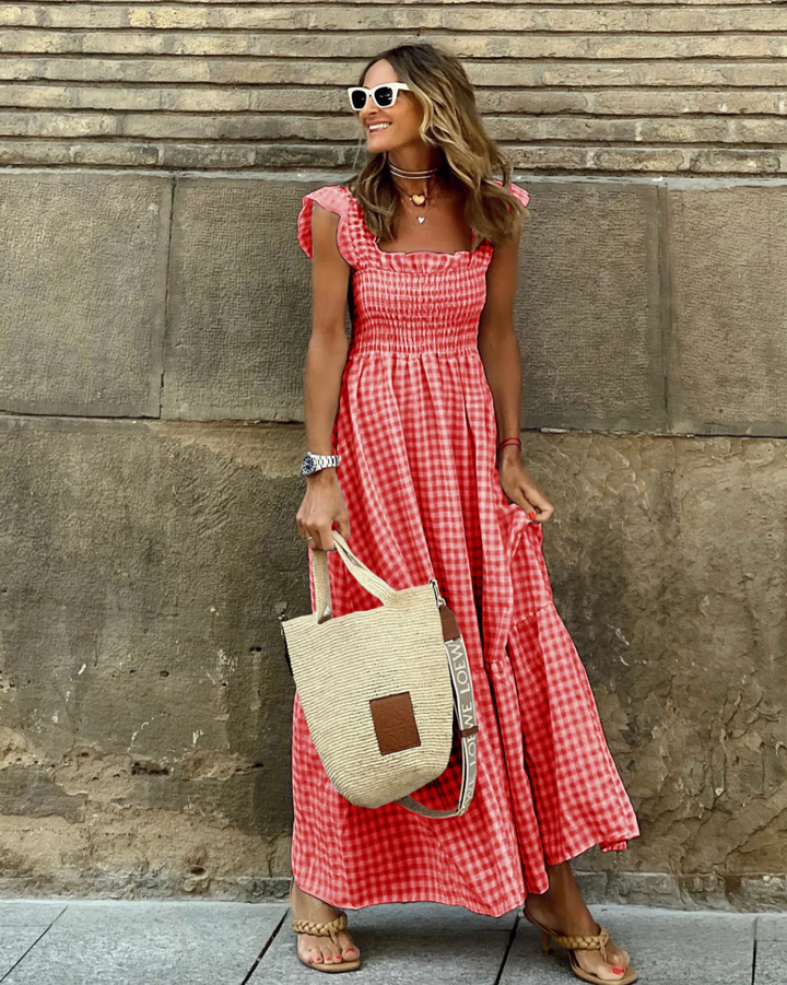 Versatile women's smocked maxi dress. Flowy design, elegant for events, comfortable for casual summer.