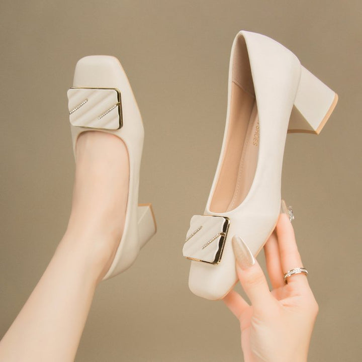Women's elegant square toe pumps featuring a trendy buckle accent.