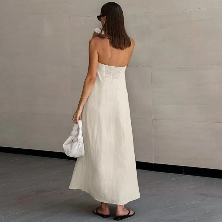 Flowy women's strapless maxi dress, exuding effortless elegance for summer, beach holidays, or special occasions.