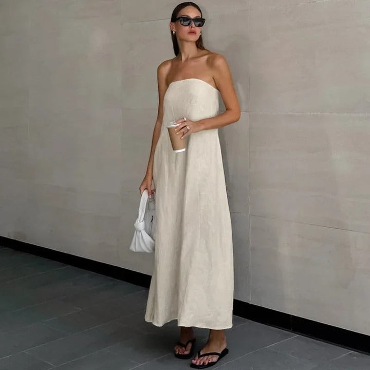 Chic women's strapless maxi dress. Versatile and elegant for summer occasions, holiday wear, or a minimalist look.
