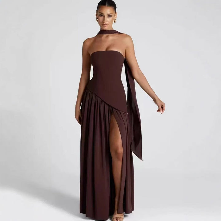 Elegant women's strapless evening gown with a flattering leg split, suitable for sophisticated parties & events.