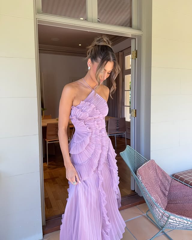 Stylish women's textured strapless maxi dress, elegant and layered for any evening or special event.