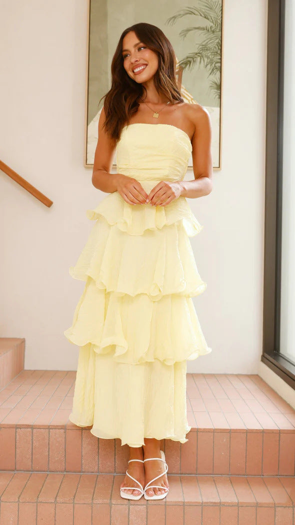 Graceful women's tiered ruffle strapless maxi dress, a beautiful choice for wedding guests.