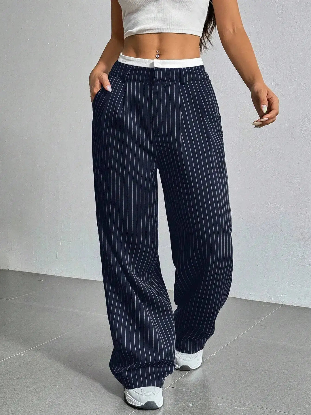 Women's elegant striped wide leg pants, high-waisted for comfort. Perfect for office or casual spring wear.