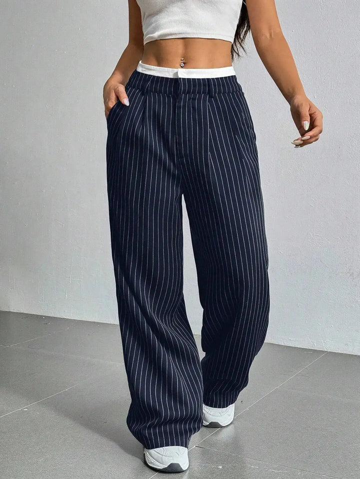 Women's elegant striped wide leg pants, high-waisted for comfort. Perfect for office or casual spring wear.