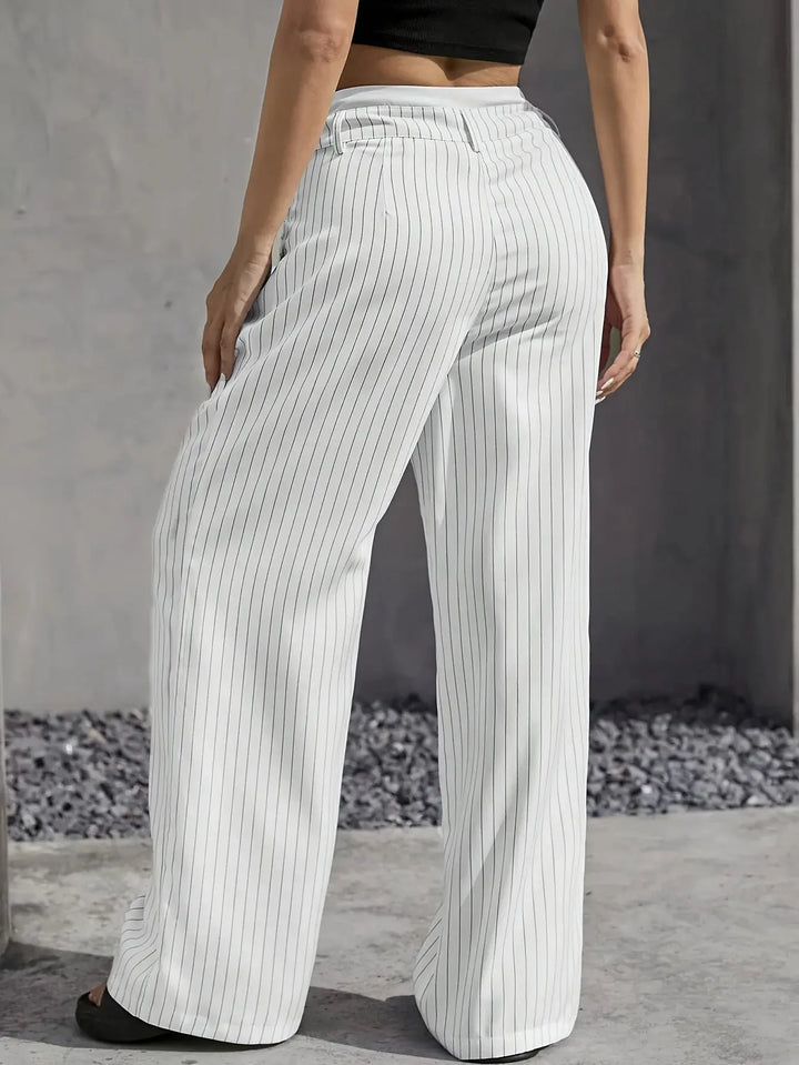Versatile women's high-waisted striped wide leg trousers. Elegant, comfortable for spring/summer fashion.