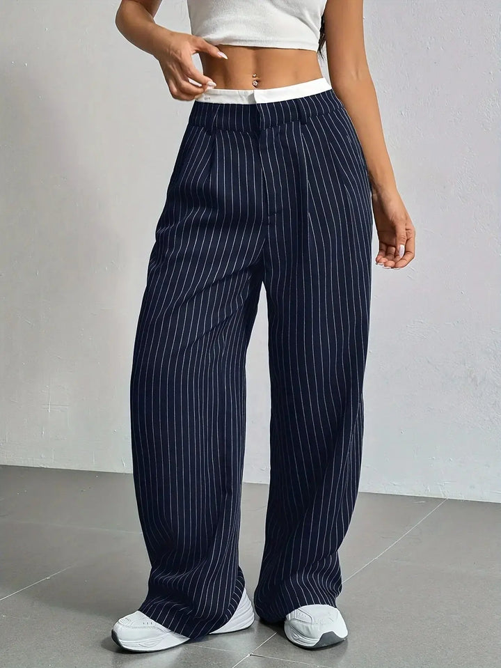 Stylish women's striped wide leg trousers, high-waisted comfort, ideal for elegant spring/summer fashion.