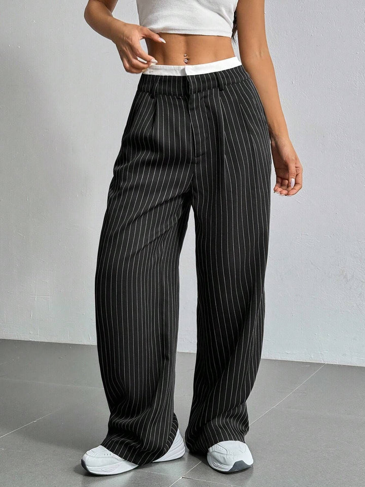 High-waisted wide leg striped pants for women. Comfortable & versatile for office wear or casual elegance.