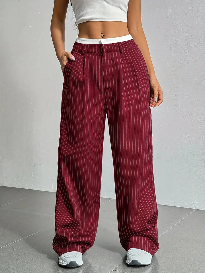 Women's fashion striped wide leg trousers. High-waisted comfort, great for spring, summer, office wear.