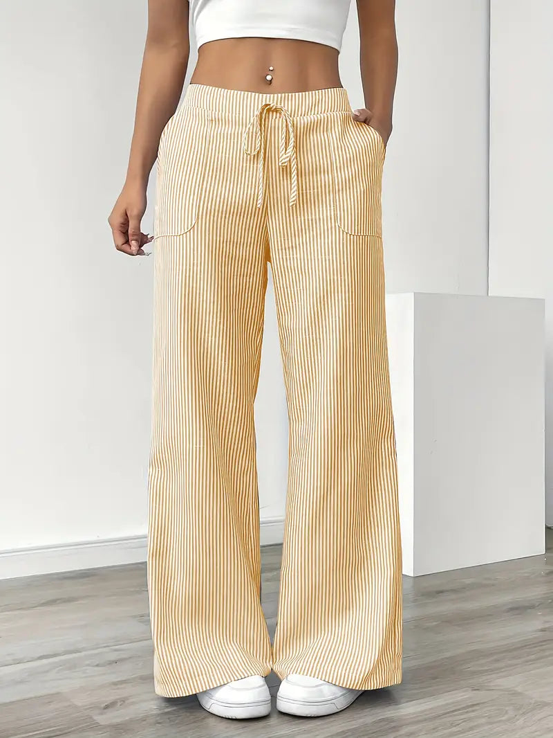 Women's elegant striped wide-leg pants with pockets, perfect for spring casual wear.