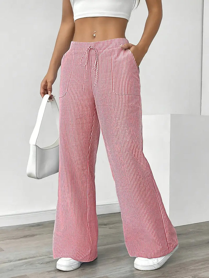 Comfortable yellow striped wide-leg pants, women's fashion with an adjustable waist.