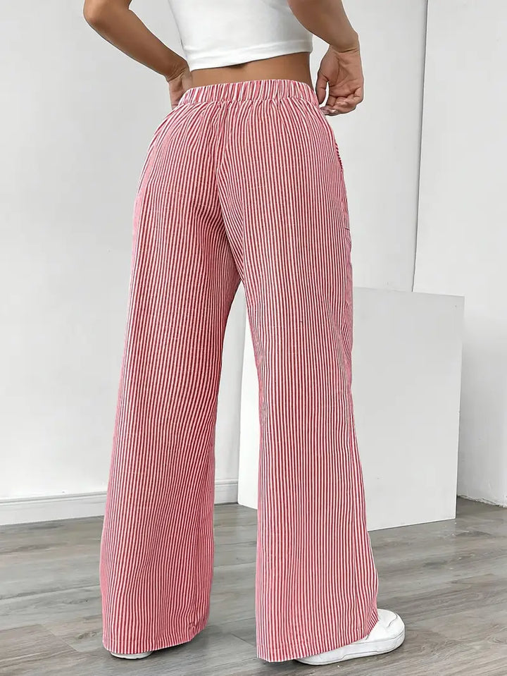 Blue striped wide-leg women's pants, a casual wear option for spring and summer.