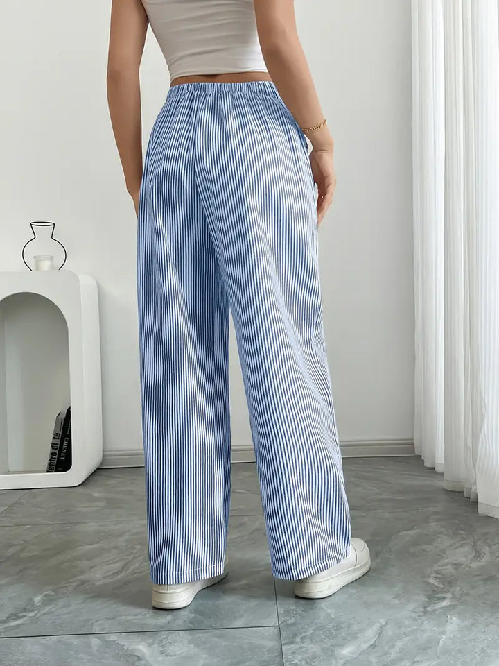 Yellow striped wide-leg pants, women's casual wear with adjustable waist and pockets.