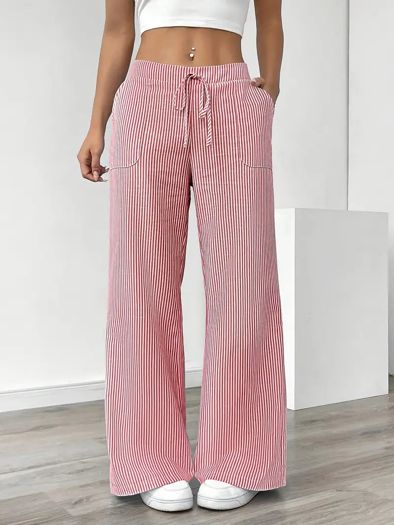 Comfortable yellow striped wide-leg pants for women, ideal for summer style.