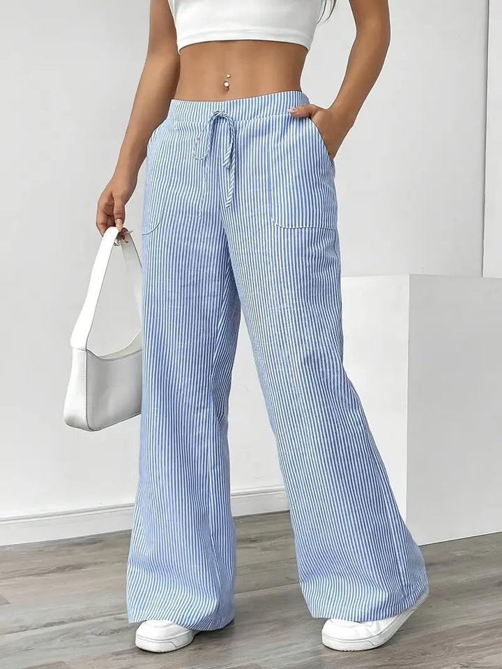 Grey striped wide-leg pants for women, elegant and versatile for daily wear.