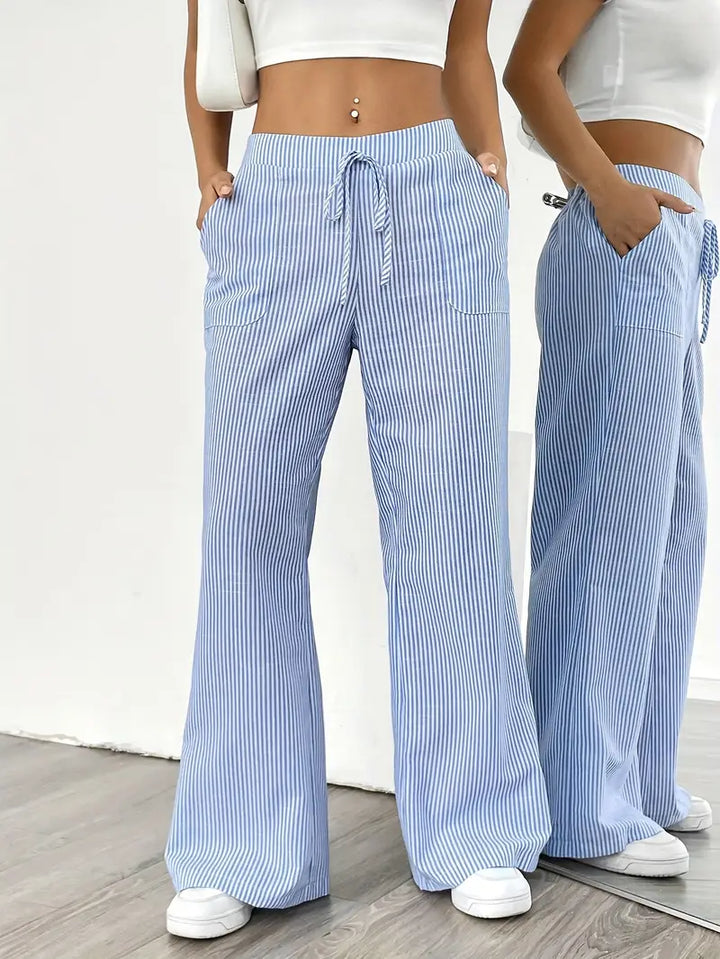 Women's elegant striped wide-leg pants, featuring convenient side pockets.