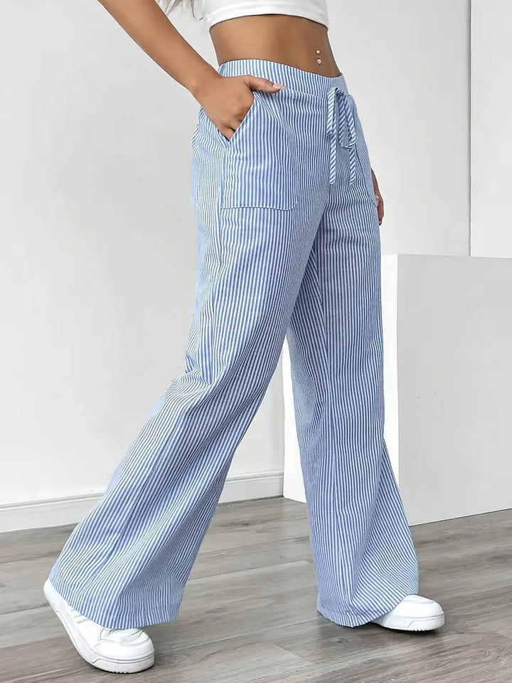 Stylish pink striped wide-leg pants, women's casual elegant wear with pockets.