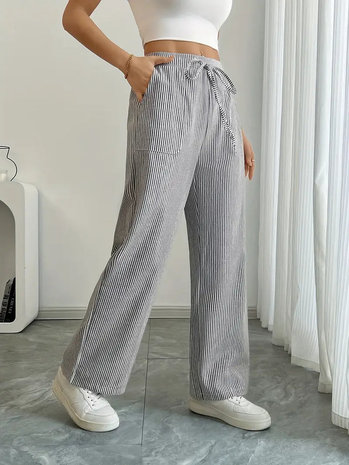 Grey striped wide-leg pants, women's elegant everyday wear with an adjustable waist.