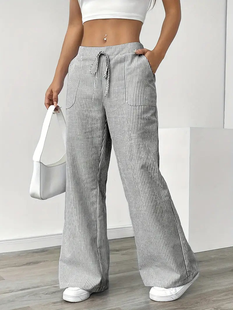 Pink striped wide-leg pants for women, a chic summer outfit with adjustable waist.