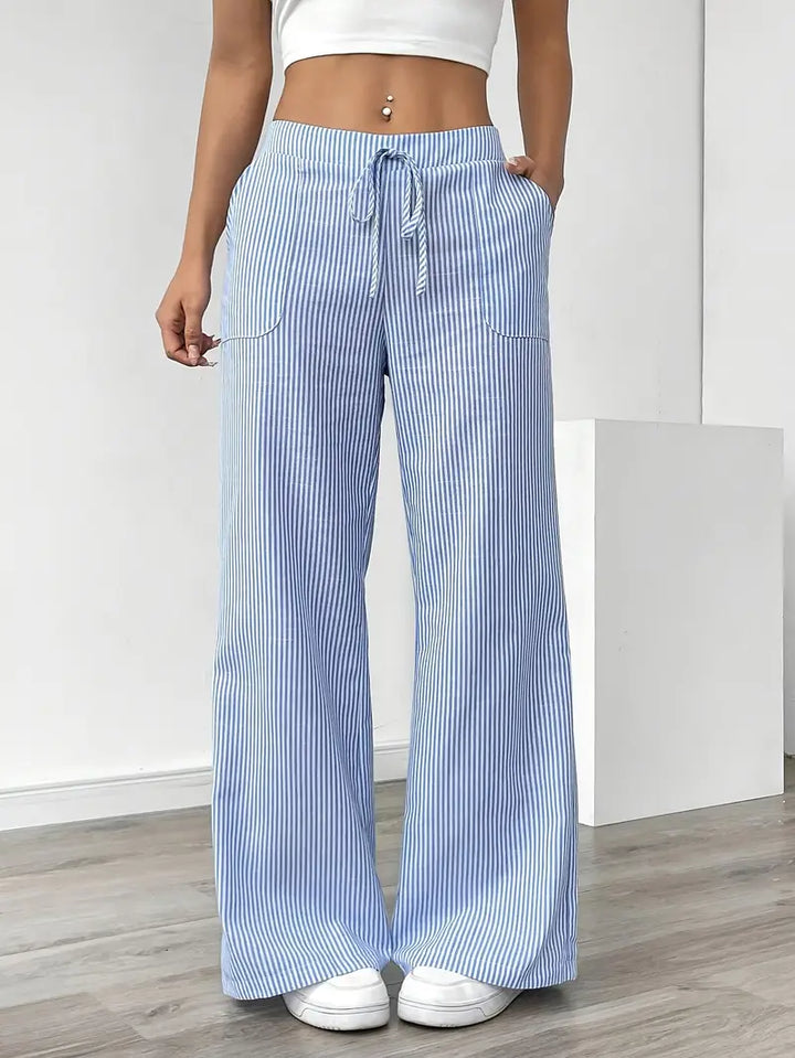 Stylish pink striped wide-leg pants for women, featuring an adjustable waist.