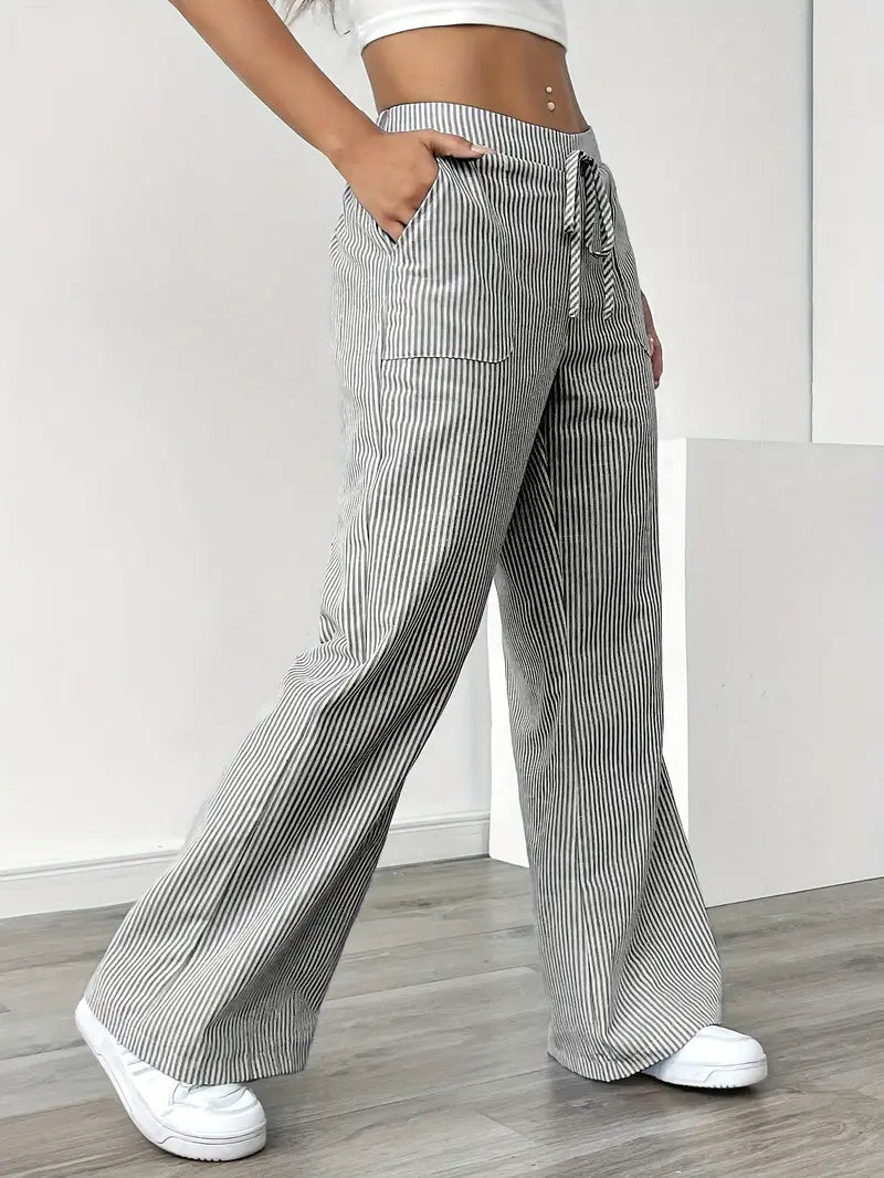 Elegant striped wide-leg pants for women, perfect for a chic summer look.