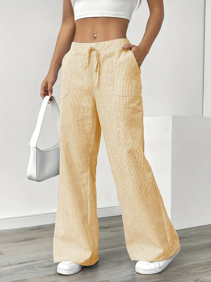 Chic grey striped wide-leg pants for women, a versatile elegant casual wear option.