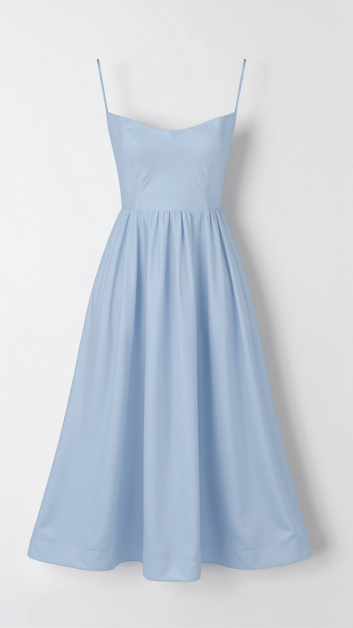 Stylish women's party midi dress with a sweetheart neck, thin straps, and a graceful flowy skirt.