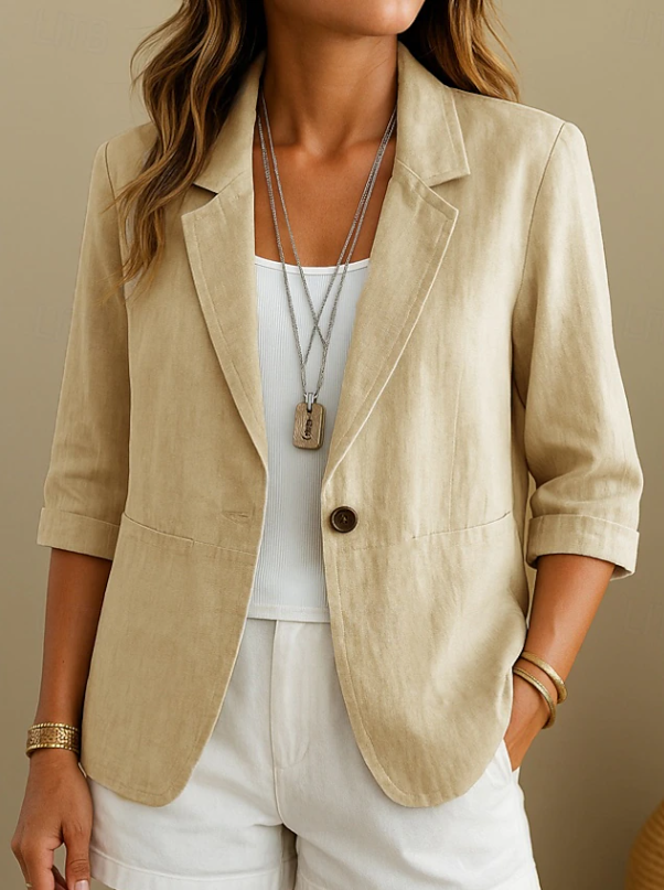 Chic women's tailored pink blazer, versatile for professional office attire or smart casual everyday jacket looks.