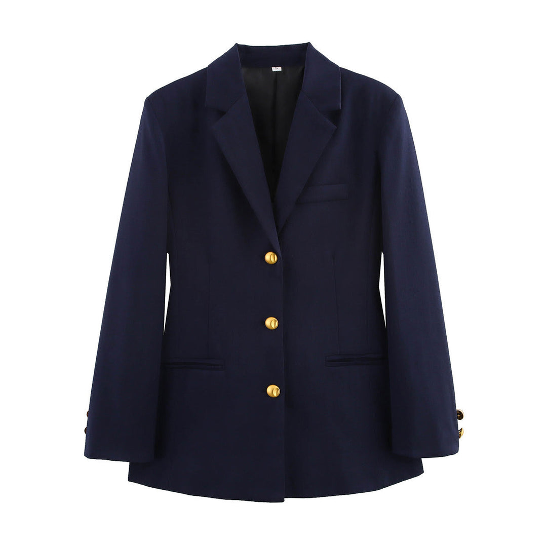 Fashionable women's blazer with elegant gold button details, perfect for a polished office look or chic outerwear.