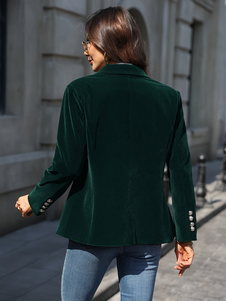 Women's elegant tailored blazer with golden buttons, perfect for professional or chic office wear.