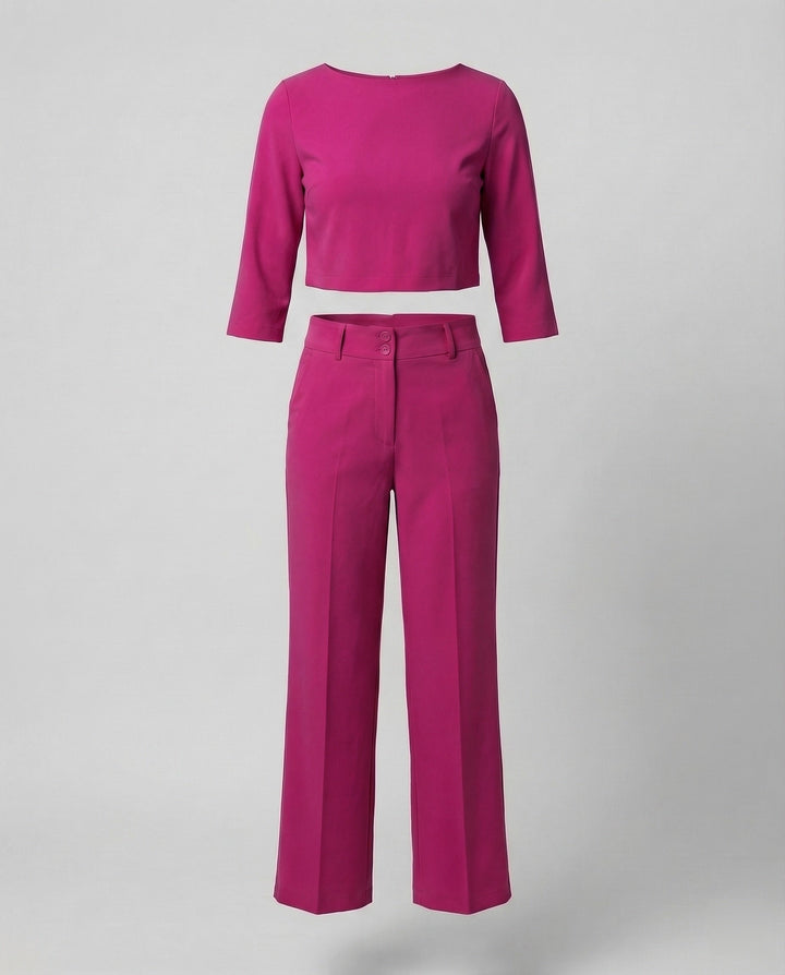 Full view of the women's tailored pants set, highlighting its chic design.