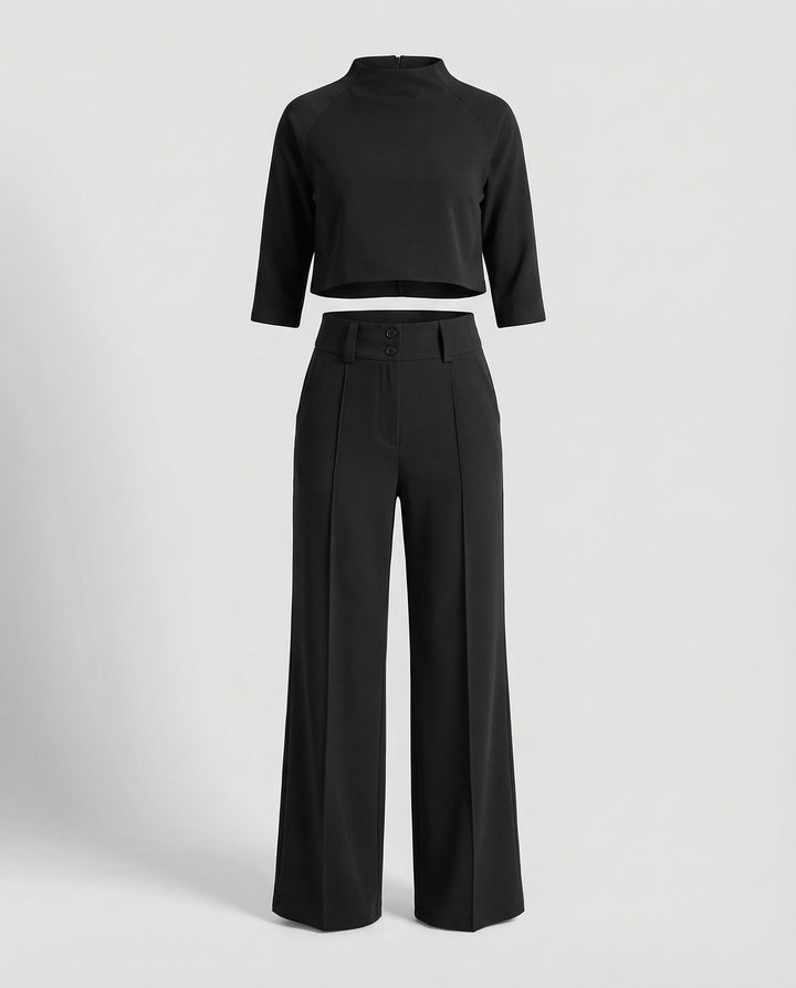 Close-up of the fabric and tailoring details on the women's autumn pants set.