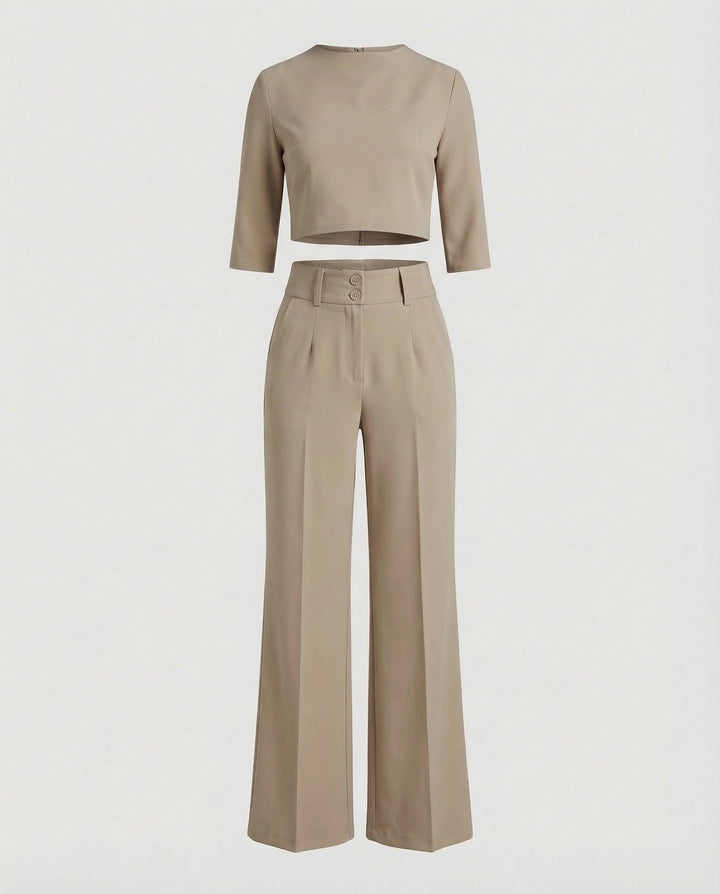 Model wearing the elegant tailored pants set, demonstrating its flattering fit.