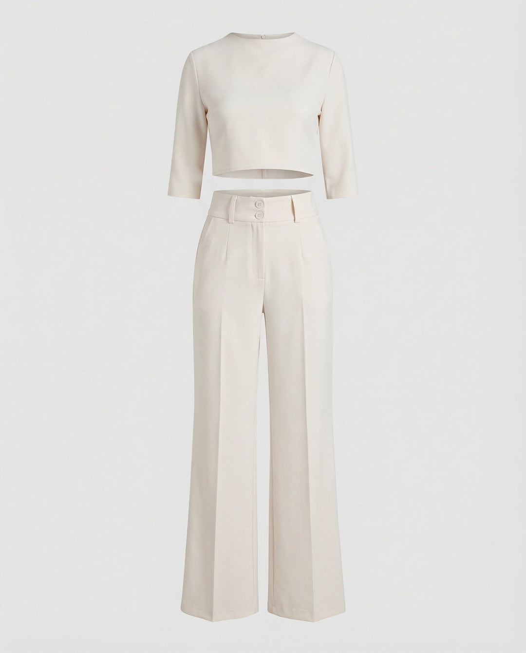 A modern women's two-piece set: tailored pants and cropped top for autumn.