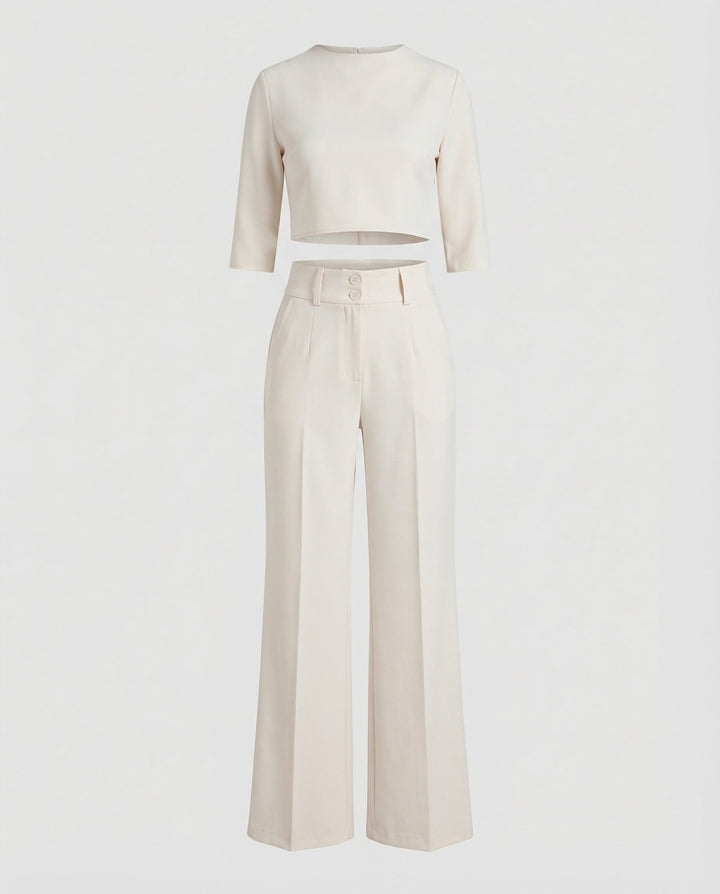 A modern women's two-piece set: tailored pants and cropped top for autumn.