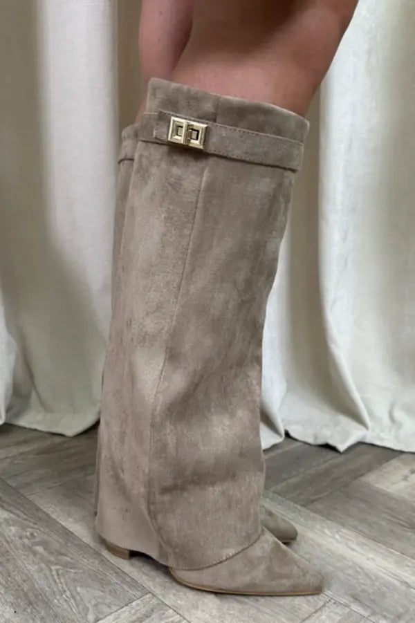 Front view of women's tall elegant boots showcasing a sleek, polished design.