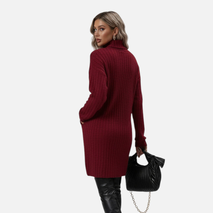 Close-up of the textured knit pattern on a women's long sleeve turtleneck dress